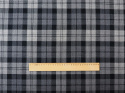 wełna w szarą kratę tartan