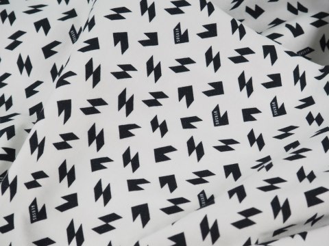Dzianina sygnowana - Geometryczne wzory na bieli Dzianina sygnowana - Geometryczne wzory na bieli