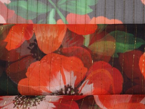 Jedwab szyfon - Pomarańczowe maki na czerni Jedwab szyfon - Pomarańczowe maki na czerni