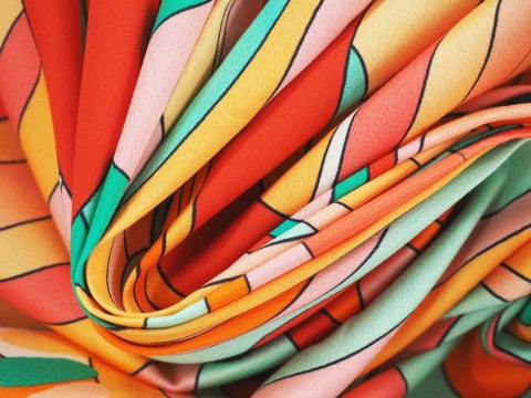 Bawełna elastyczna - Pomarańczowe wzory geometryczne Bawełna elastyczna - Pomarańczowe wzory geometryczne