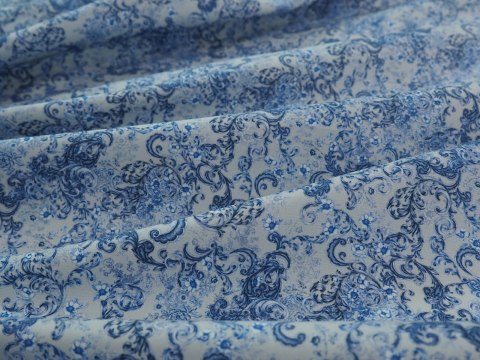 Bawełna - Niebieskie ornamenty na gołębim tle Bawełna - Niebieskie ornamenty na gołębim tle